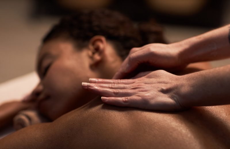 Massaging Neck of Female